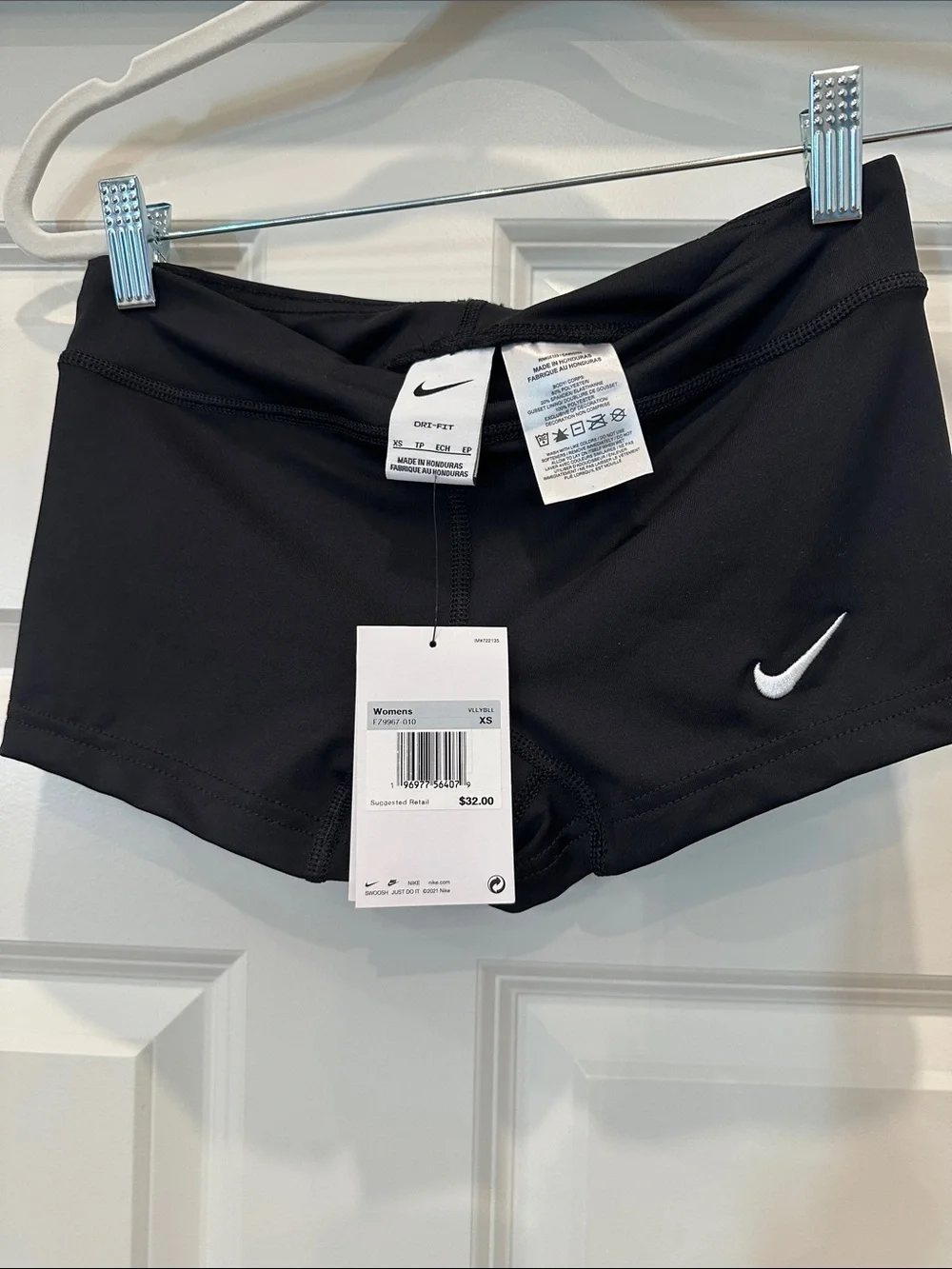 Nike Women's Black Athletic Shorts with White Swoosh Accent